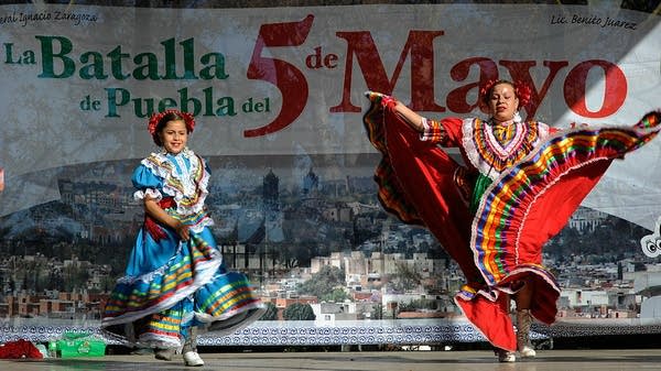 Dancers with Mexica Ballet Folclorico perform during Cinco de Mayo festivities at El Pueblo de Los Angeles Historic Site in downtown Los Angeles.Kevork Djansezian/Getty Images
